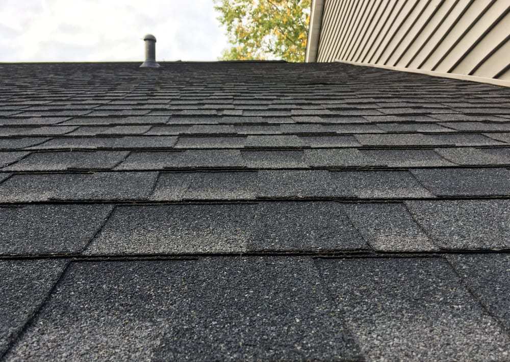 The Disadvantages of Installing New Shingles Over Old Shingles